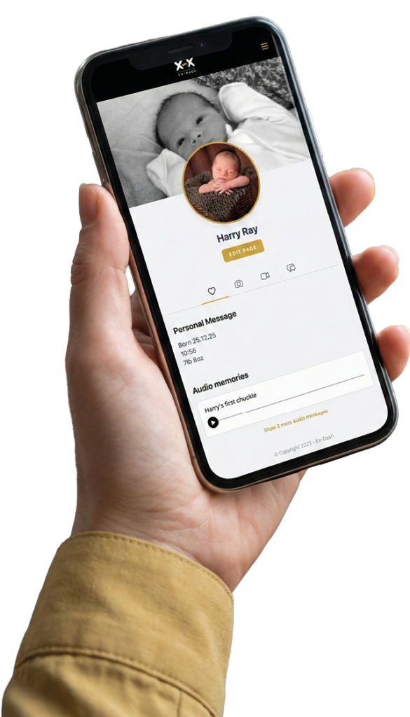 Hand holding smartphone displaying baby profile.